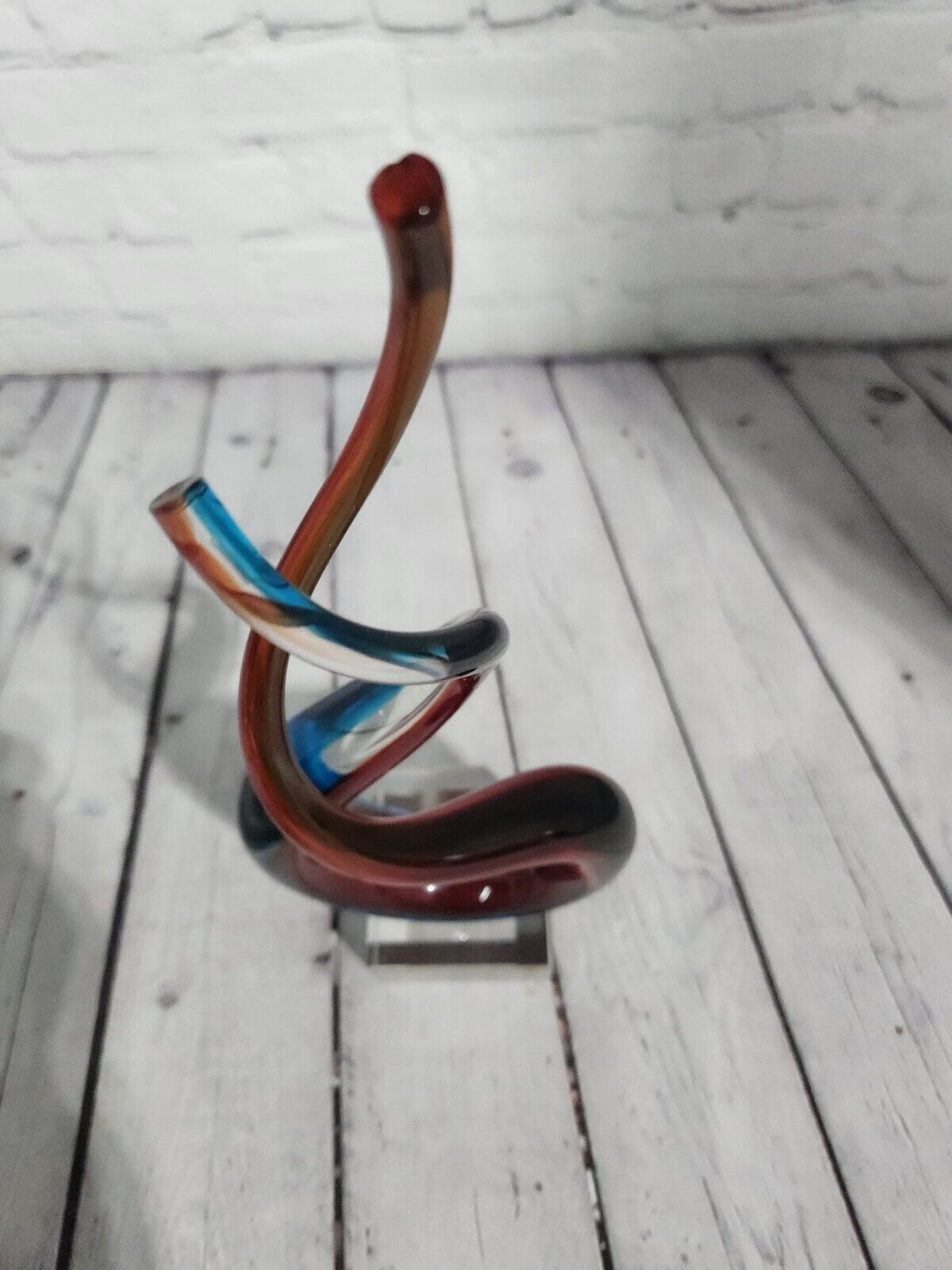 Red & Blue Helix Art Glass Award features a red & blue helix shaped glThis Red & Blue Helix Art Glass Award features a red & blue helix shaped piece of glass mounted on a clear glass base for personalization.This stunning VintaChas Vintage ShopRed & Blue Helix Art Glass Award features