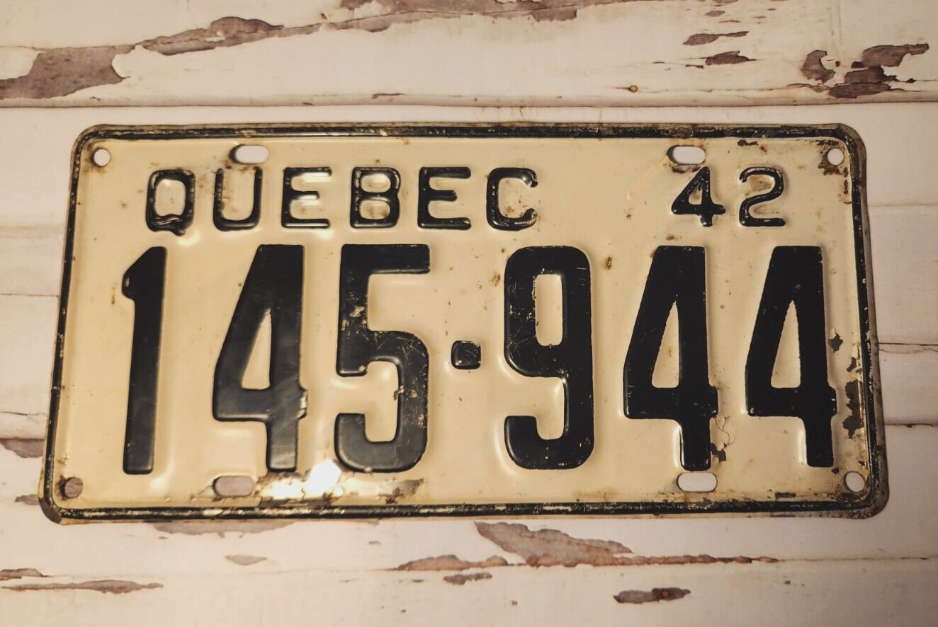 Quebec 1942 licence plate - vintage quebec car licence plateVintage Quebec car licence plate from 1942. This authentic license plate from Quebec is a perfect addition to your collection of automobilia and transportation memorChas Vintage ShopQuebec 1942 licence plate - vintage quebec car licence plate