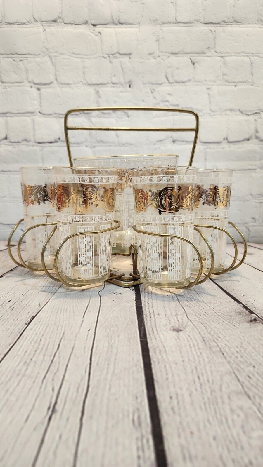 Mid century modern 8 glasses and ice bucket bar tray retro barware carAdd a touch of mid-century modern style to your bar with this beautiful glass bar tray. Thsi complete set comes with : 8 glasses , glass ice bucket and metal in goldChas Vintage Shopice bucket bar tray retro barware carrousel