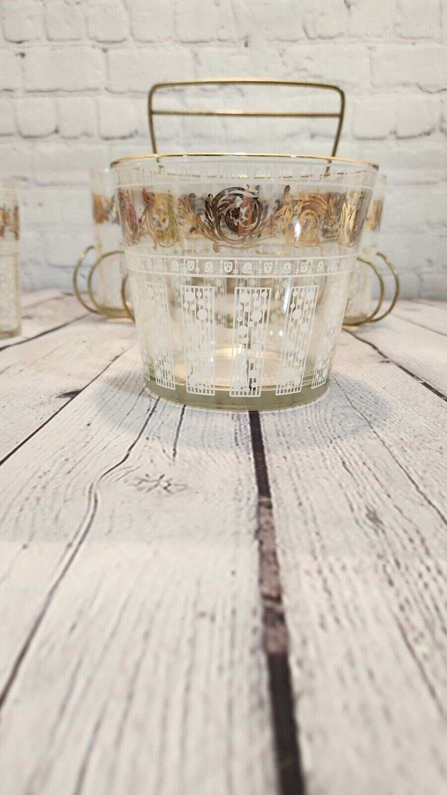 Mid century modern 8 glasses and ice bucket bar tray retro barware carAdd a touch of mid-century modern style to your bar with this beautiful glass bar tray. Thsi complete set comes with : 8 glasses , glass ice bucket and metal in goldChas Vintage Shopice bucket bar tray retro barware carrousel
