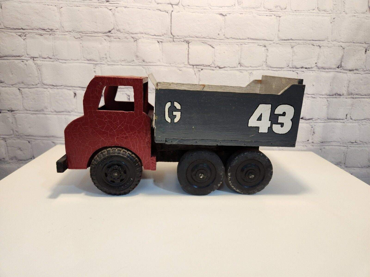 Vintage hand made toy truk wood / metal dump truck vintage handcraftThis vintage dump truck is a unique find for any collector or lover of handcrafted toys. Made of wood and metal, this truck was hand made in Canada in 1966. It is reChas Vintage ShopVintage hand made toy truk wood / metal dump truck vintage handcrafted toys
