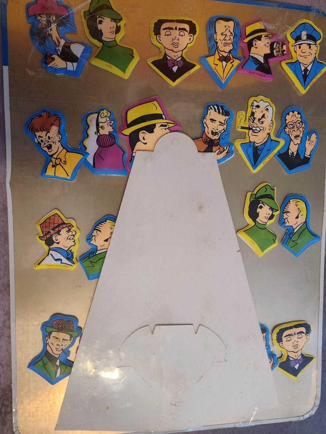 Dick  tracy sealed vintage magnetic tv & cartoon pals puffy stickers aAdd some vintage flair to your collection with these sealed Dick Tracy Magnetic TV & Cartoon Pals puffy stickers and display. This Hong Kong-made set features thChas Vintage ShopDick tracy sealed vintage magnetic tv & cartoon pals puffy stickers