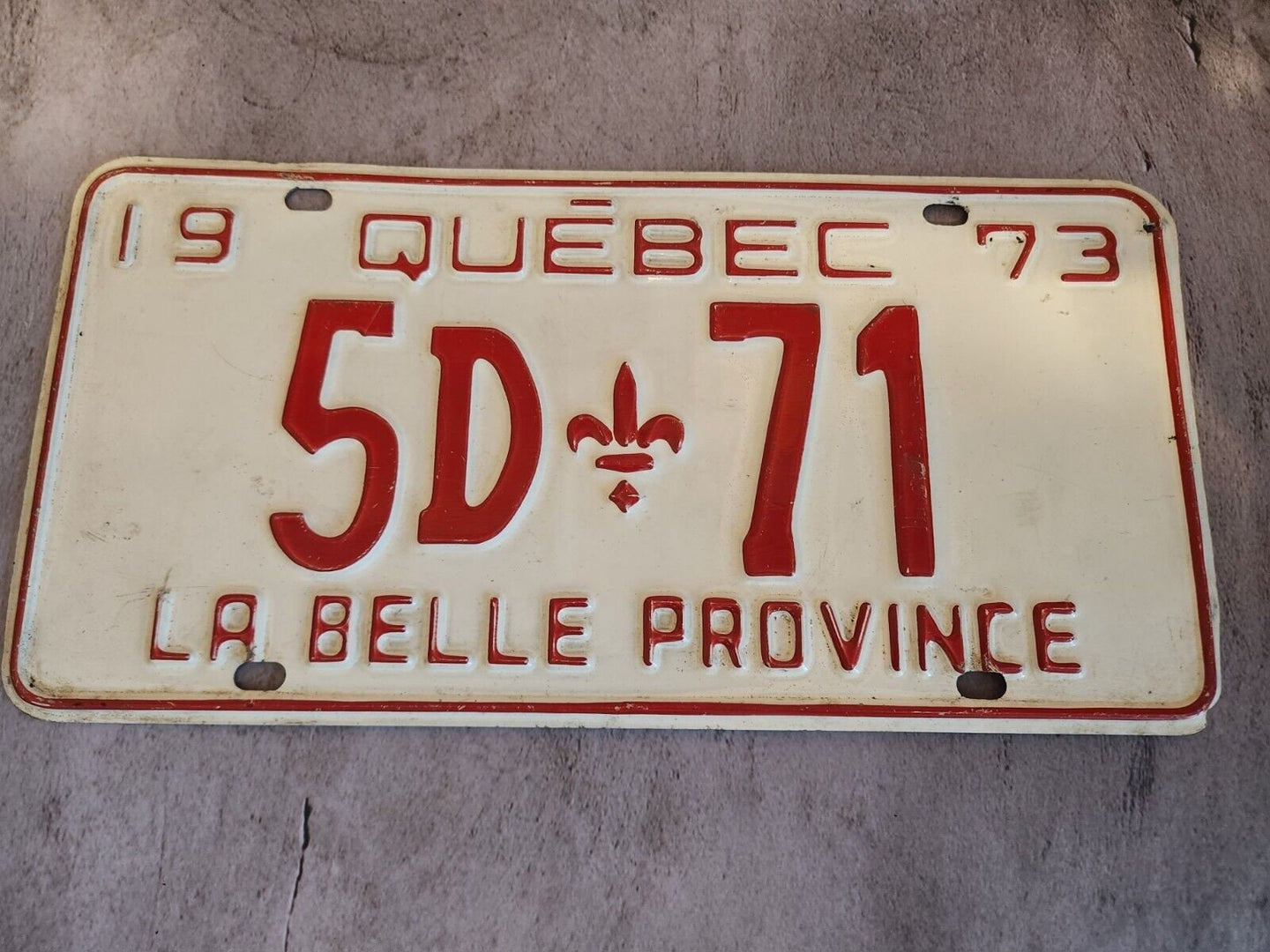 1973 quebec licence plate quebec vintage licence plate low numberQuebec 1973 licence plate, vintage and low-numbered, perfect for collectors and car enthusiasts. Made in Canada, this piece of automobilia is a rare find and a greatChas Vintage Shop1973 quebec licence plate quebec vintage licence plate low number