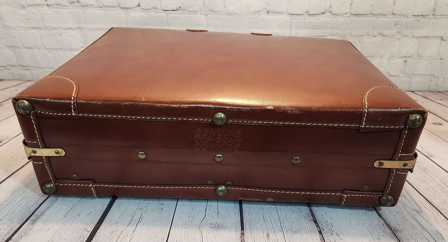Vintage brown leather suitecase smaller size vintage suitcase mid ceVintage brown leather suitecase SMALLER size of a set of 3 vintage suitcases Mid Century suitecase with protective canvas. Canada Cowhide vintage suitcaseThis vintagChas Vintage ShopVintage brown leather suitecase smaller size vintage suitcase mid century suitecase / protective canvas