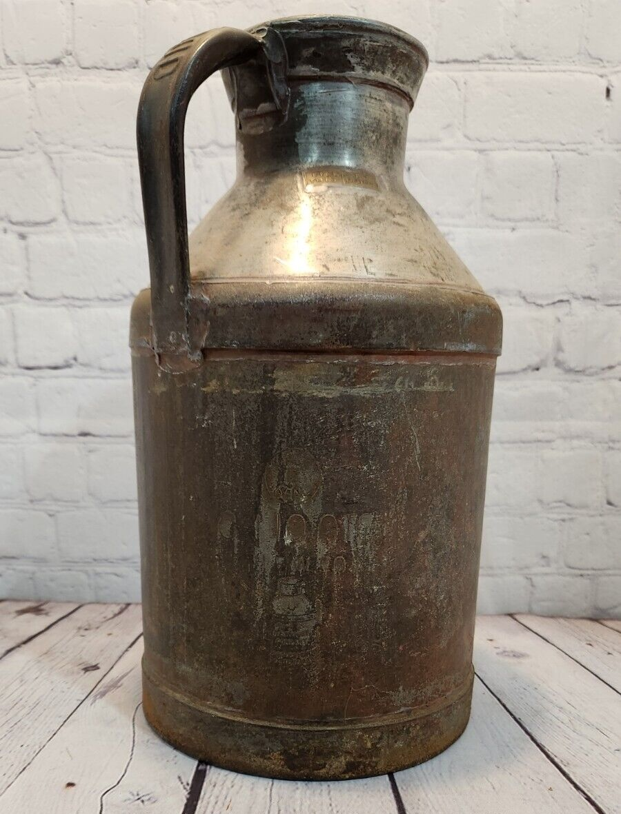 Vintage H.P. Hood & Sons  Metal Milk Can Jug w/ Handle Made in  LynnfiVintage H.P. Hood & Sons Metal Milk Can Jug w/ Handle Made in USA.  in Lynnfield, MassachusettsThis collectible dairy item from the United States is a must-have Chas Vintage ShopHood & Sons Metal Milk