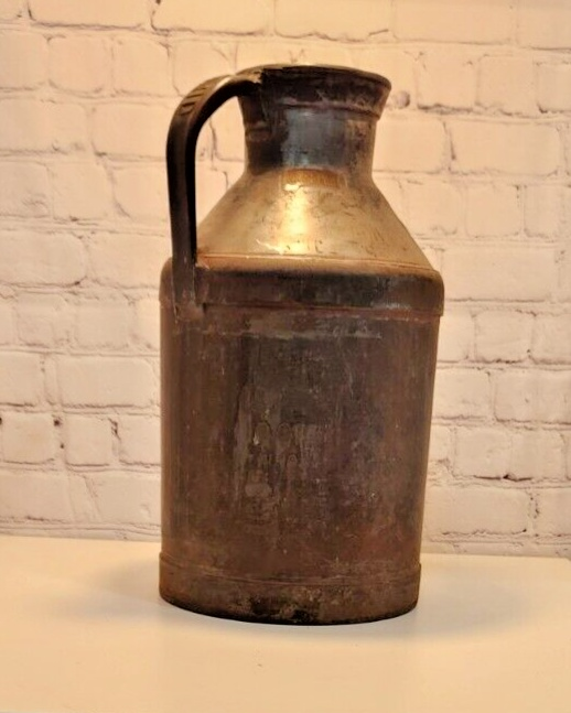 Vintage H.P. Hood & Sons  Metal Milk Can Jug w/ Handle Made in  LynnfiVintage H.P. Hood & Sons Metal Milk Can Jug w/ Handle Made in USA.  in Lynnfield, MassachusettsThis collectible dairy item from the United States is a must-have Chas Vintage ShopHood & Sons Metal Milk