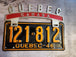 Vintage QUEBEC CANADA License Plate Topper  new old stock never been oVintage License Plate Topper Quebec Canada  License Plate Topper new old stockThis fine exemple of a vintage topper was made in the 1940's in Montreal by Farrell ManChas Vintage ShopVintage QUEBEC CANADA License Plate Topper