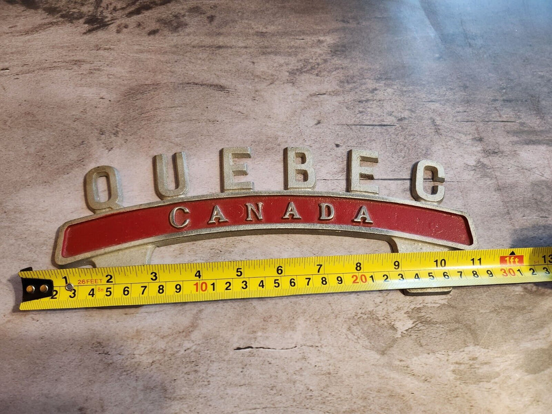 Vintage QUEBEC CANADA License Plate Topper  new old stock never been oVintage License Plate Topper Quebec Canada  License Plate Topper new old stockThis fine exemple of a vintage topper was made in the 1940's in Montreal by Farrell ManChas Vintage ShopVintage QUEBEC CANADA License Plate Topper