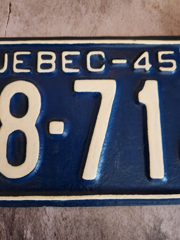 1945 Quebec licence plate. Vintage Quebec licence plate . Repaint1945 Quebec licence plate. Vintage Quebec licence plate . Repainted by a pro. Plate is flat and present very wellChas Vintage Shop1945 Quebec licence plate