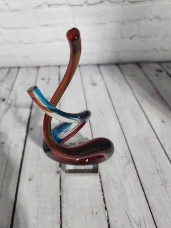 Red & Blue Helix Art Glass Award features a red & blue helix shaped glThis Red & Blue Helix Art Glass Award features a red & blue helix shaped piece of glass mounted on a clear glass base for personalization.This stunning VintaChas Vintage ShopRed & Blue Helix Art Glass Award features