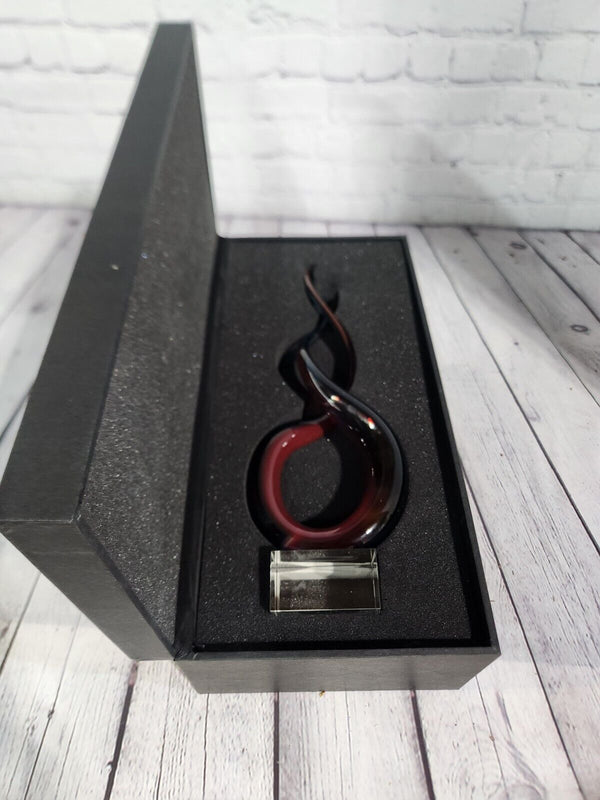 Red & Blue Helix Art Glass Award features a red & blue helix shaped glThis Red & Blue Helix Art Glass Award features a red & blue helix shaped piece of glass mounted on a clear glass base for personalization.This stunning VintaChas Vintage ShopRed & Blue Helix Art Glass Award features