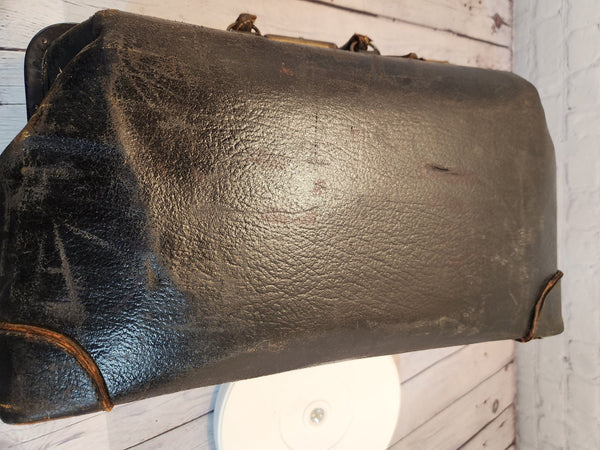 Vintage black cowhide doctor leather bag  antique doctor bag medical lVintage black cowhide Doctor leather bag Antique doctor bag Medical leatherbagYes there are condition issues, but that's what makes it so charming and a great
decoraChas Vintage ShopVintage black cowhide doctor leather bag antique doctor bag medical leatherbag classic md leather bag classic doctor leather bag