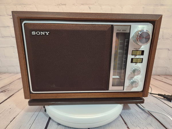 Sony vintage radio vintage sony am/fm radio model icf-9740w two band tVintage Sony AM/FM radio model ICF-9740W two band table top faux walnut woodmade in the 1970s- Works great !There is a brake in the plastic frame under the radio.A rChas Vintage ShopSony vintage radio vintage sony
