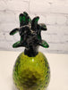 Hand blown glass pineapple murano style amber and greenThis vintage Hand Blown Glass Pineapple is a stunning piece of art that will instantly add a retro vibe to any space. The Murano-style pineapple features a beautifulChas Vintage ShopHand blown glass pineapple murano style amber