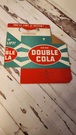 Bring back the good times with this  double cola collector six pack anRelive the nostalgia of the classic Double Cola with this amazing collector set!This set includes a porcelain Double Cola sign, six Double Cola bottles, and a DoubleChas Vintage Shopdouble cola collector