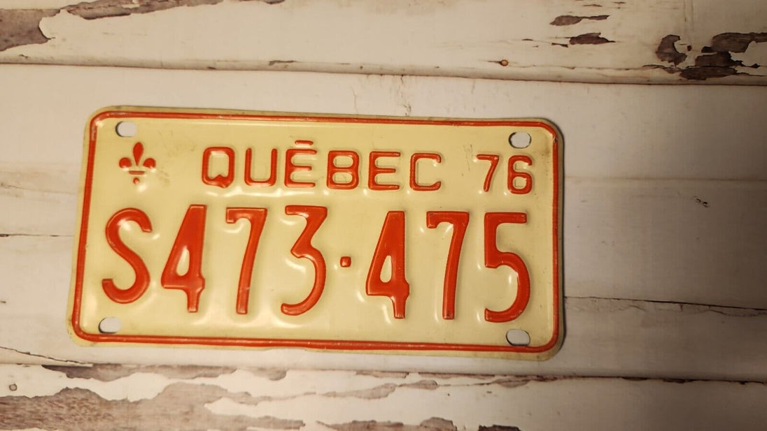 1976 Quebec licence plate  Vintage 1976 Quebec snowmobile licence platVintage 1976 Quebec licence plate, perfect for collectors of automobilia and transportation memorabilia. 
 
This snowmobile plate was manufactured in Canada and is aChas Vintage Shop1976 Quebec licence plate Vintage 1976 Quebec snowmobile licence plate