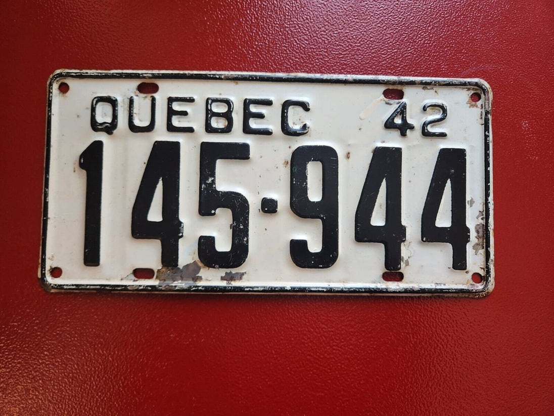 Quebec 1942 licence plate - vintage quebec car licence plateVintage Quebec car licence plate from 1942. This authentic license plate from Quebec is a perfect addition to your collection of automobilia and transportation memorChas Vintage ShopQuebec 1942 licence plate - vintage quebec car licence plate