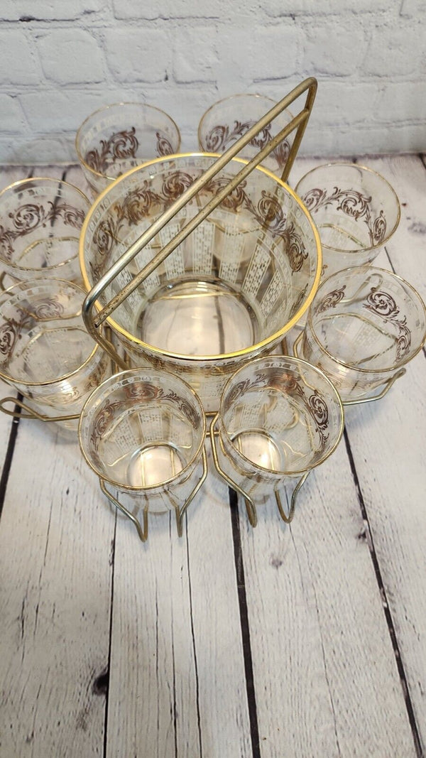 Mid century modern 8 glasses and ice bucket bar tray retro barware carAdd a touch of mid-century modern style to your bar with this beautiful glass bar tray. Thsi complete set comes with : 8 glasses , glass ice bucket and metal in goldChas Vintage Shopice bucket bar tray retro barware carrousel