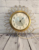 Vintage mid century  sunburst 1960s westclox wall clock, 11" inches. rAdd a touch of retro charm to your home with this vintage mid-century Westclox wall clock. The clock features a round shape with a gold-tone metal frame sunburst desChas Vintage ShopVintage mid century sunburst 1960s westclox wall clock, 11" inches