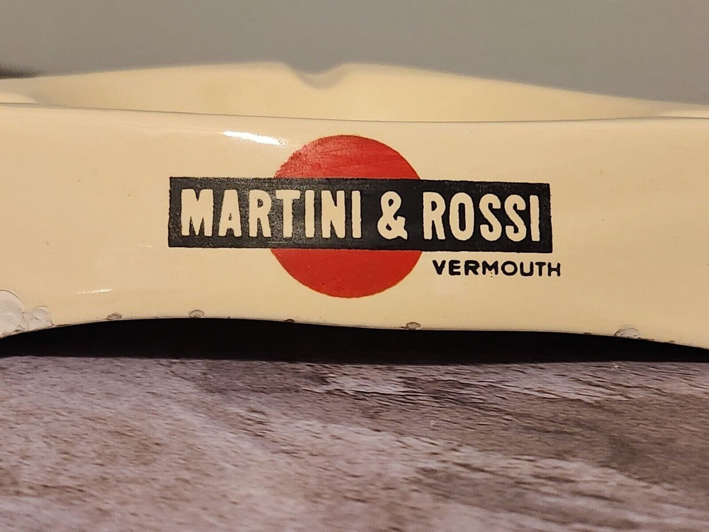 Larger martini rossi vintage ashtray 1960's martini rossi ashtray porcAdd a touch of vintage elegance to your smoking area with this Martinin Rossi ashtray. Made in Italy, this ashtray features a classic design that will complement anyChas Vintage ShopLarger martini rossi vintage ashtray 1960'