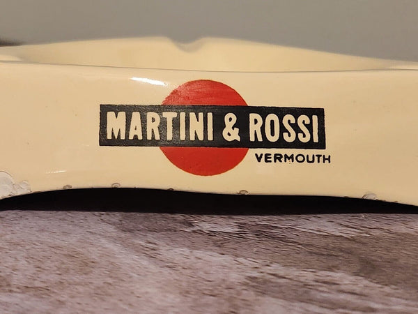 Larger martini rossi vintage ashtray 1960's martini rossi ashtray porcAdd a touch of vintage elegance to your smoking area with this Martinin Rossi ashtray. Made in Italy, this ashtray features a classic design that will complement anyChas Vintage ShopLarger martini rossi vintage ashtray 1960'