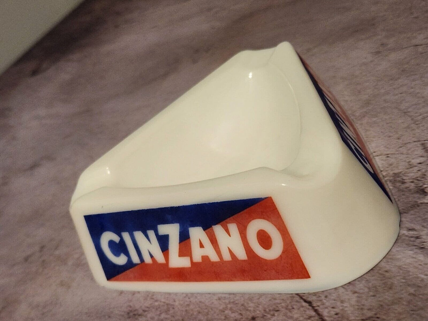 Vintage cinzano milk glass ashtray by  vetreria lusvardi di milano froThis vintage ashtray by Vetreria Lusvardi di Milano is a stunning piece of Italian craftsmanship from the 1960s. Made of milk glass and featuring the iconic Cinzano Chas Vintage ShopVintage cinzano milk glass ashtray