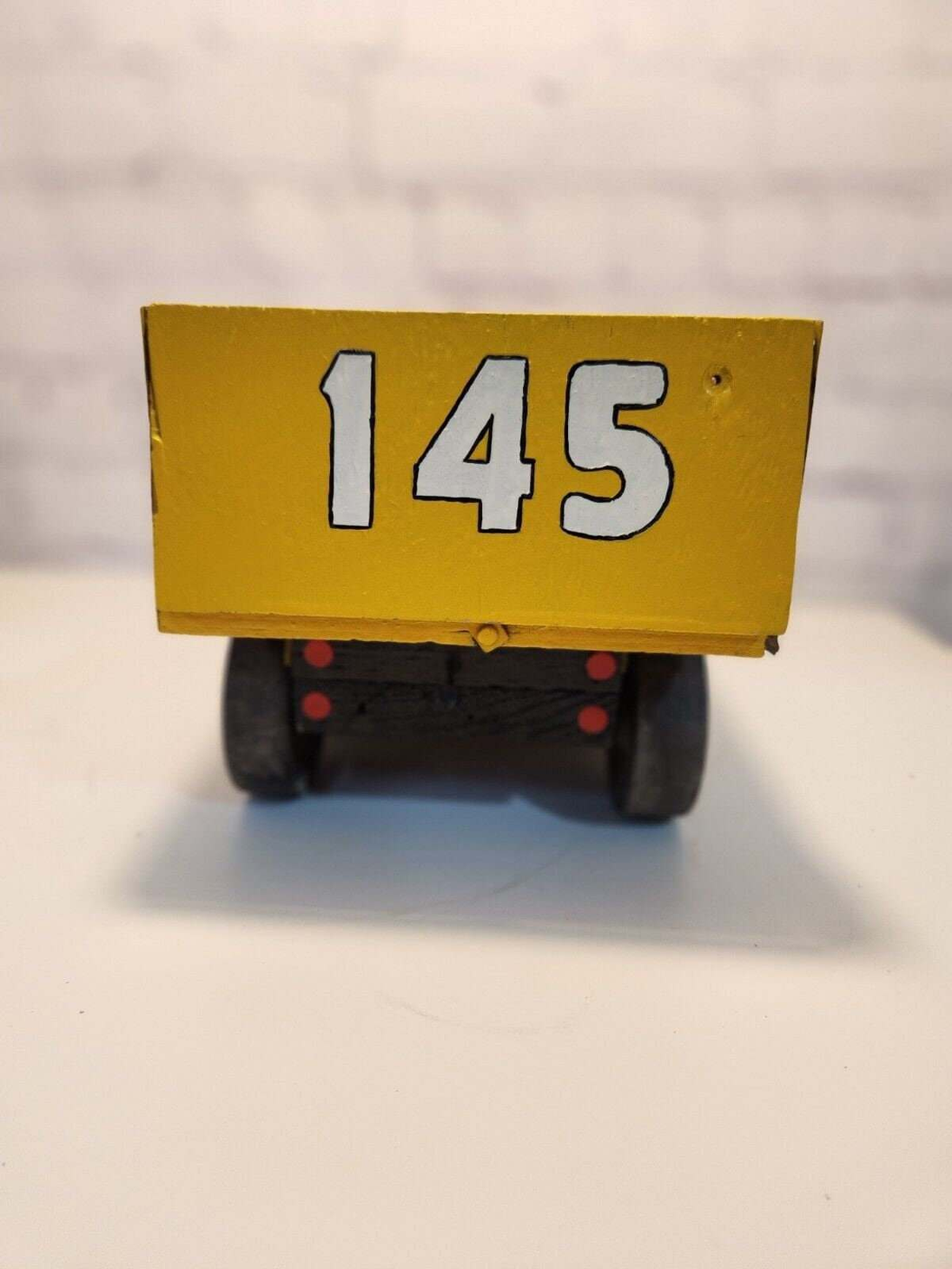 Vintage hand made toy truck  wood / metal dump truck  vintage handcrafThis vintage dump truck is a unique find for any collector or lover of handcrafted toys. Made of wood and metal, this truck was hand made in Canada in 1966. It is reChas Vintage ShopVintage hand made toy truck wood / metal dump truck vintage handcrafted toys