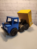 Vintage hand made toy truk  wood / metal dump truck  vintage handcraftThis vintage dump truck is a unique find for any collector or lover of handcrafted toys. Made of wood and metal, this truck was hand made in Canada in 1964. It is reChas Vintage ShopVintage hand made toy truk wood / metal dump truck vintage handcrafted toys