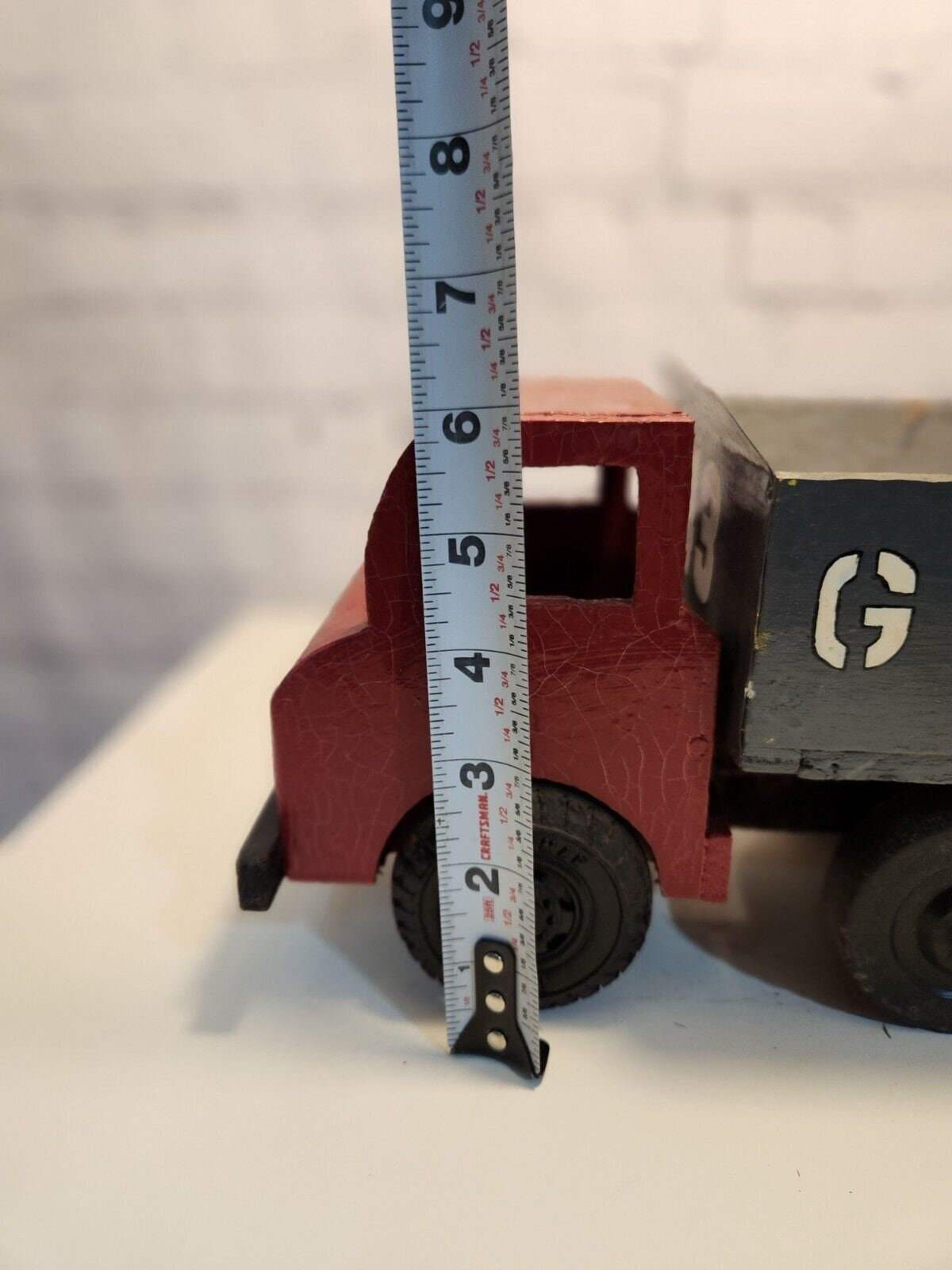 Vintage hand made toy truk  wood / metal dump truck  vintage handcraftThis vintage dump truck is a unique find for any collector or lover of handcrafted toys. Made of wood and metal, this truck was hand made in Canada in 1966. It is reChas Vintage ShopVintage hand made toy truk wood / metal dump truck vintage handcrafted toys