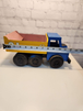 Vintage hand made toy truk  wood / metal dump truck  vintage handcraftThis vintage dump truck is a unique find for any collector or lover of handcrafted toys. Made of wood and metal, this truck was hand made in Canada in 1964. It is reChas Vintage ShopVintage hand made toy truk wood / metal dump truck vintage handcrafted toys