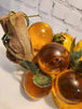 Vtg mcm cluster of large amber honey  lucite acrylic grapes  with plasThis vintage mid-century cluster of large amber honey lucite acrylic grapes with plastic leaves is a timeless piece of art that will add a touch of elegance to any sChas Vintage Shoplarge amber honey lucite acrylic grapes