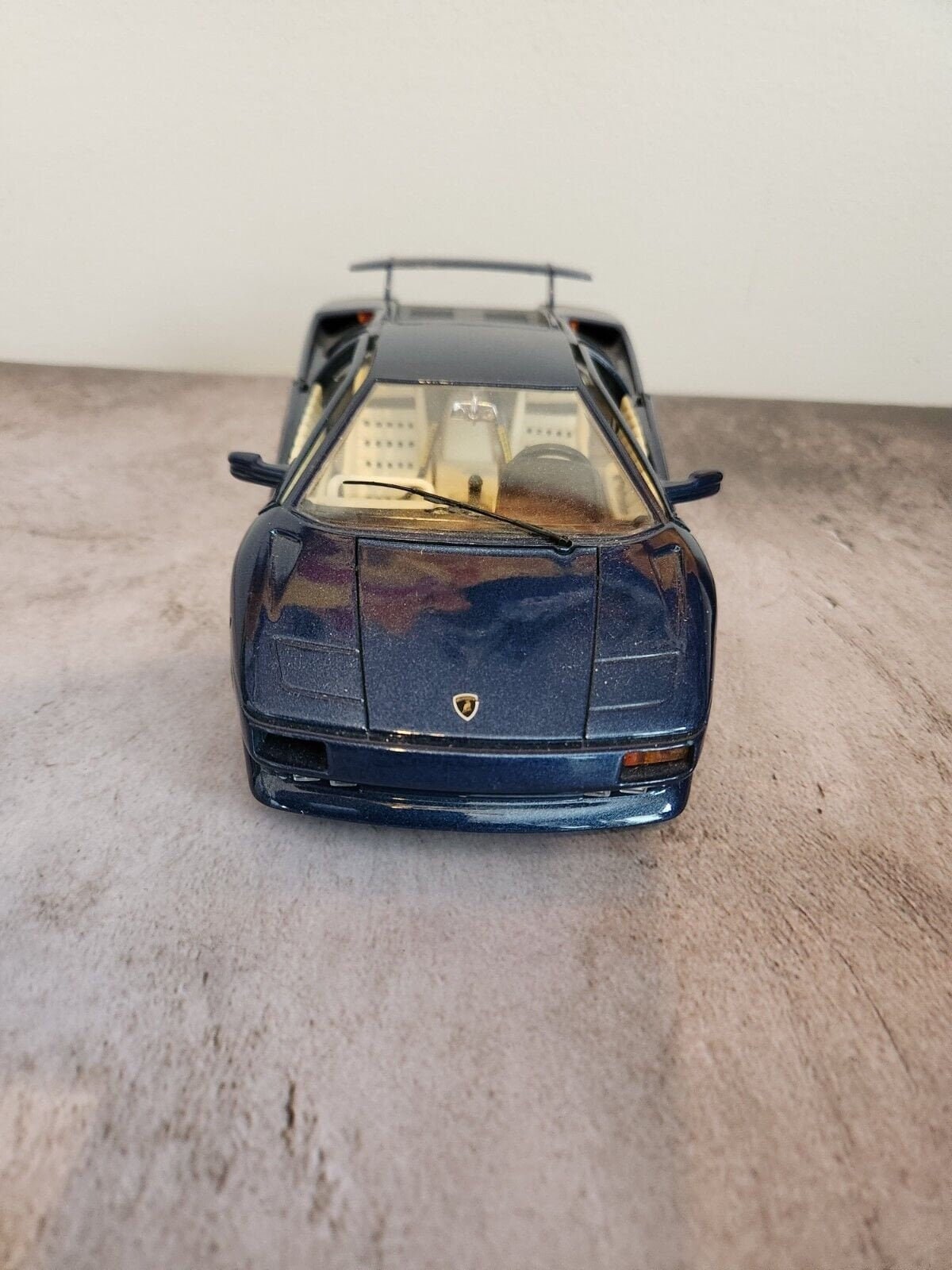 Blue 1990  burago lamborghini countach  1:18 die cast made in italyThis 1:18 die-cast Lamborghini Countach from Burago's Bburago Gold series is a stunning addition to any car enthusiast's collection. Made in Italy in 1990, the blue Chas Vintage ShopBlue 1990 burago lamborghini countach 1