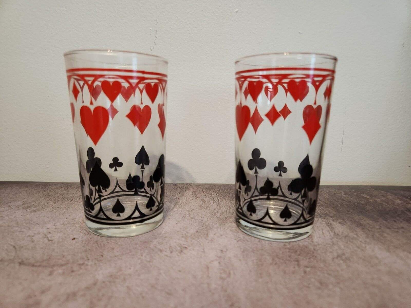 2 vintage schwartz mustard glass dominion glass  playing card poker drGet your poker night started with these vintage Schwartz's mustard glass highball glasses from Dominion Glass. Featuring a playful playing card design in multicolor,Chas Vintage Shop2 vintage schwartz mustard glass dominion glass playing card poker drink glass