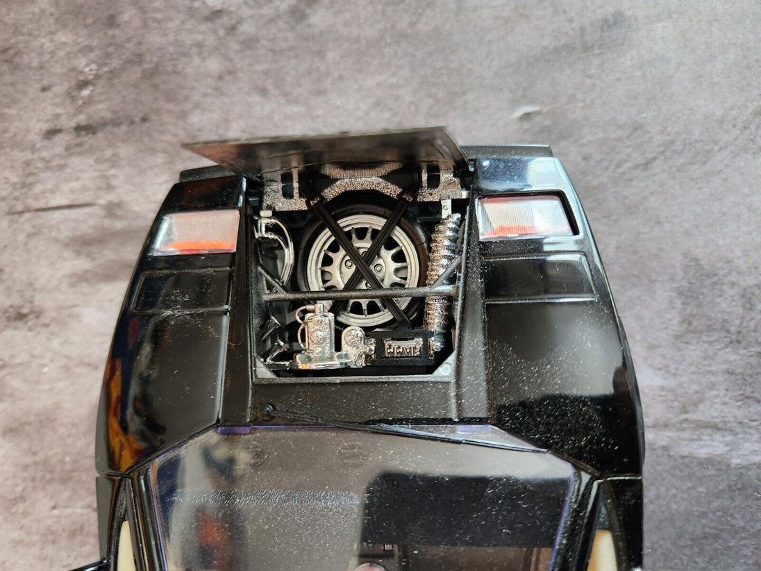 Black  burago lamborghini countach  1:18 die cast made in italyThis 1:18 scale diecast model of a 1988 Lamborghini Countach is a stunning addition to any car enthusiast's collection. Made by Burago, a renowned Italian brand, theChas Vintage ShopBlack burago lamborghini countach 1