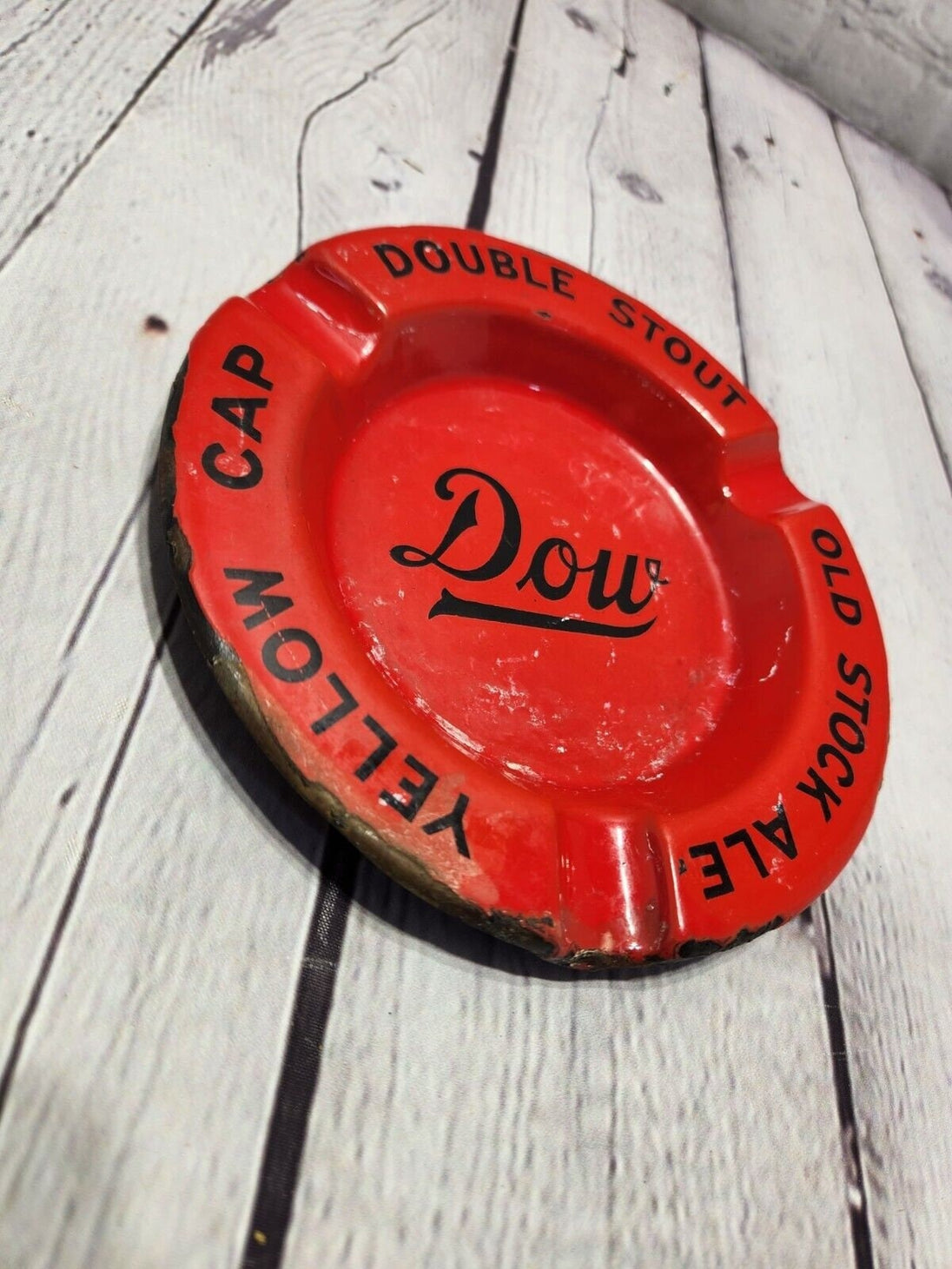 Vintage dow brewery porcelain  ashtray dow double stout old stock yellThis vintage Dow brewery red porcelain over steel ashtray is a must-have for collectors of breweriana. Made in Canada, it features the logos of DOW Double Stout, OldChas Vintage ShopVintage dow brewery porcelain ashtray dow double stout