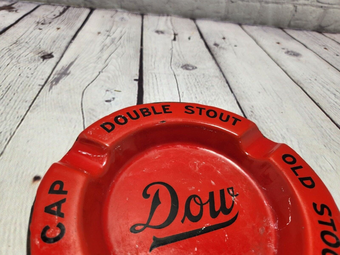 Vintage dow brewery porcelain  ashtray dow double stout old stock yellThis vintage Dow brewery red porcelain over steel ashtray is a must-have for collectors of breweriana. Made in Canada, it features the logos of DOW Double Stout, OldChas Vintage ShopVintage dow brewery porcelain ashtray dow double stout