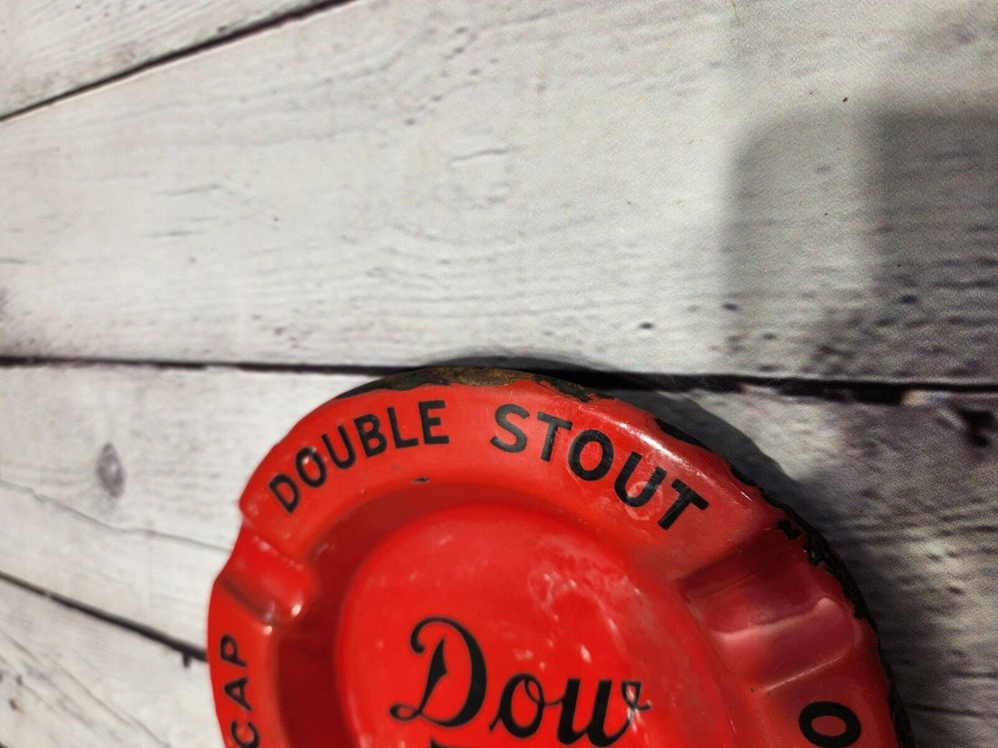 Vintage dow brewery porcelain  ashtray dow double stout old stock yellThis vintage Dow brewery red porcelain over steel ashtray is a must-have for collectors of breweriana. Made in Canada, it features the logos of DOW Double Stout, OldChas Vintage ShopVintage dow brewery porcelain ashtray dow double stout