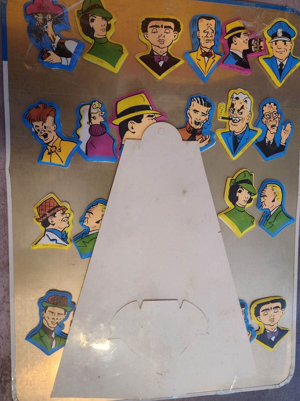 Dick  tracy sealed vintage magnetic tv & cartoon pals puffy stickers aAdd some vintage flair to your collection with these sealed Dick Tracy Magnetic TV & Cartoon Pals puffy stickers and display. This Hong Kong-made set features thChas Vintage ShopDick tracy sealed vintage magnetic tv & cartoon pals puffy stickers