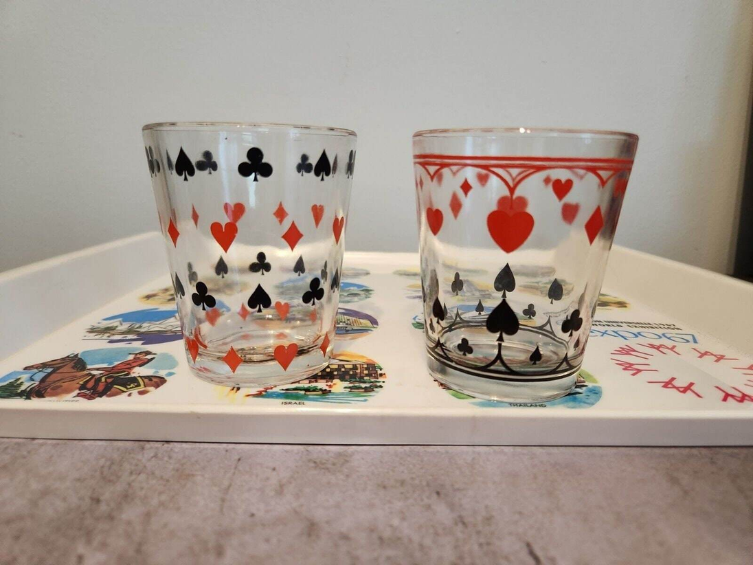 2 vintage schwartz mustard glass dominion glass  playing card poker drAdd some vintage flair to your poker night with these 2 Schwartz's Mustard Glass Dominion Glass drinking glasses. With a pattern of clubs and hearts, these low ball Chas Vintage Shop2 vintage schwartz mustard glass dominion glass playing card poker drink glass