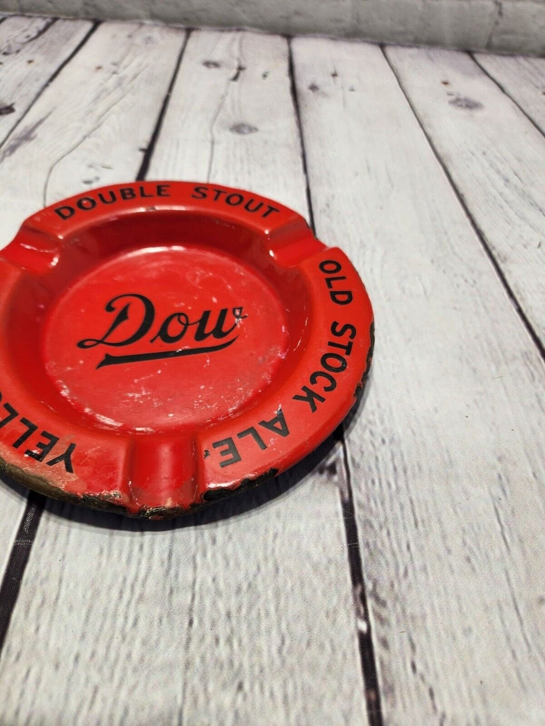 Vintage dow brewery porcelain  ashtray dow double stout old stock yellThis vintage Dow brewery red porcelain over steel ashtray is a must-have for collectors of breweriana. Made in Canada, it features the logos of DOW Double Stout, OldChas Vintage ShopVintage dow brewery porcelain ashtray dow double stout