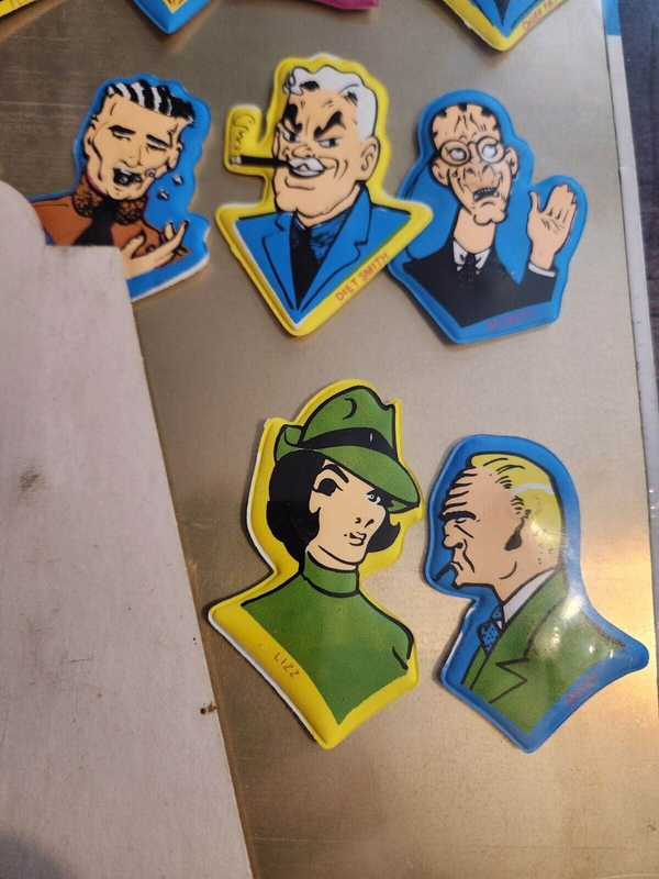 Dick  tracy sealed vintage magnetic tv & cartoon pals puffy stickers aAdd some vintage flair to your collection with these sealed Dick Tracy Magnetic TV & Cartoon Pals puffy stickers and display. This Hong Kong-made set features thChas Vintage ShopDick tracy sealed vintage magnetic tv & cartoon pals puffy stickers