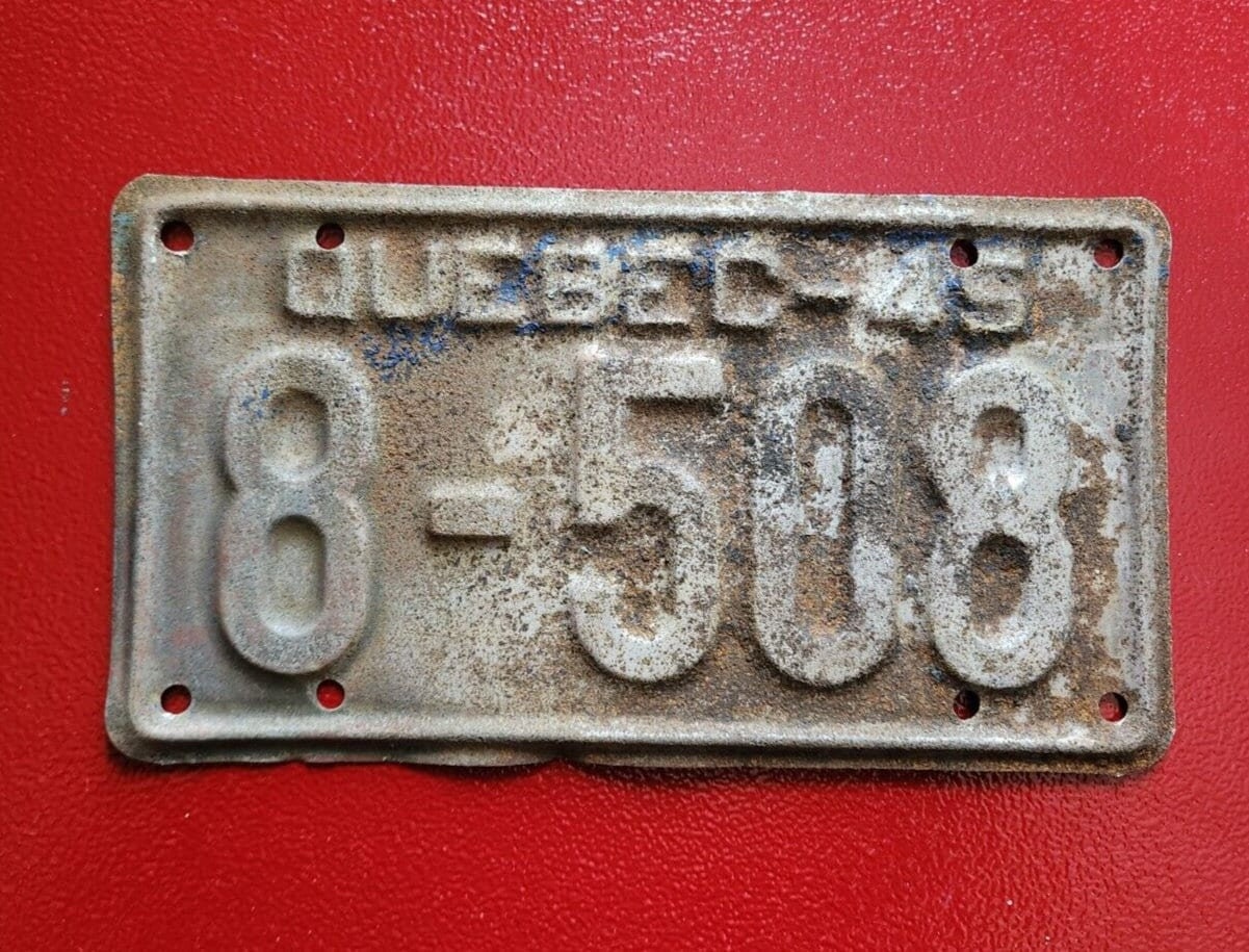 1945 quebec car licence plate  vintage quebec 1945 licence plate nice Vintage 1945 Quebec car licence plate with a beautiful patina. This smaller size plate has a desirable and less common low numberThis collectible item is a piece of Chas Vintage Shop1945 quebec car licence plate vintage quebec 1945 licence plate nice patina