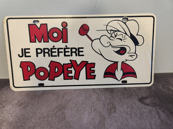 Popeye french booster plate - je préfère popeye i prefer popeye cartooThis vintage Popeye booster plate from Canada is a must-have for any collector of automobilia and transportation memorabilia.Made in Canada, this unique French plateChas Vintage ShopPopeye french