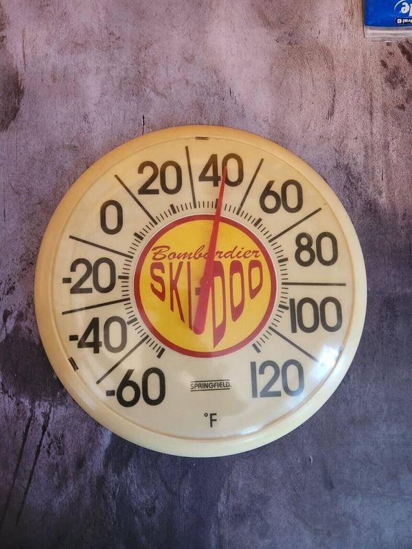 Ski doo vintage round advertising thermometer - bombardier vintage advThis vintage Ski Doo advertising thermometer from the 1960s is a perfect addition to any collection of vintage ski doo Bombardier memorabilia. The round thermometer Chas Vintage ShopSki doo vintage round advertising thermometer - bombardier vintage advertizing