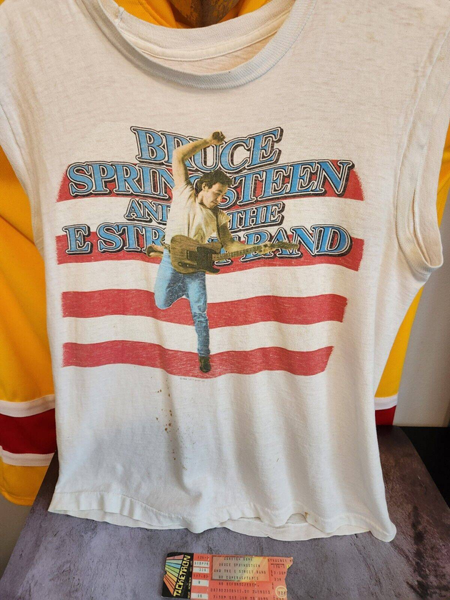 Bruce springsteen t shirt + show ticket from the  born in the usa 84-8BORN IN THE USA TOUR Memorabilia T-shirt AND concert ticket !Bruce Springsteen T shirt and ticket from the Born in he the USA 84-85 tour I bought this new at Bruce sChas Vintage Shopshirt + show ticket