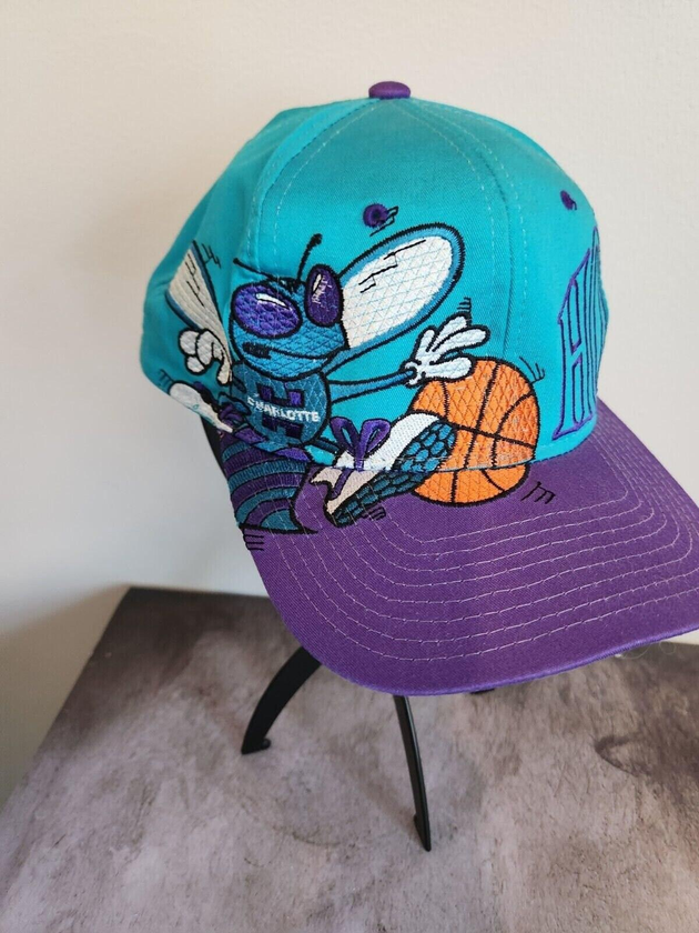 Vintage 1990’s starter charlotte hornets nba snapback hat - super rareLike new. I bought this Hornet's cap in the 90'S wore it once and decided itwas to rare to wear. Stored for the last 30 yearsVery elaborate stichingColors and stitchChas Vintage Shopstarter charlotte hornets nba snapback hat - super rare edition