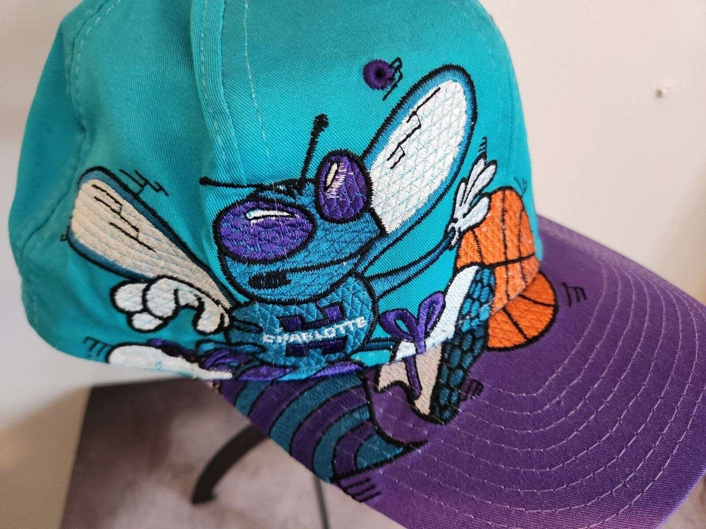 Vintage 1990’s starter charlotte hornets nba snapback hat - super rareLike new. I bought this Hornet's cap in the 90'S wore it once and decided itwas to rare to wear. Stored for the last 30 yearsVery elaborate stichingColors and stitchChas Vintage Shopstarter charlotte hornets nba snapback hat - super rare edition