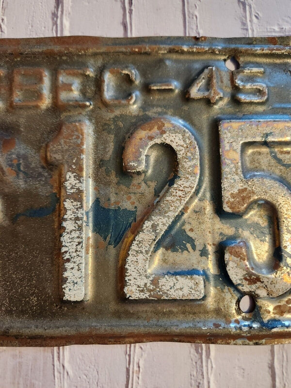 Vintage 1945 quebec dealer licence plate x licence plate low numberGreat Quebec 1945 dealer survivor plate.X 125 Great low number !These plate were not taken care of. They were used a lot coming on and off carsfor sale all timeRare Chas Vintage ShopVintage 1945 quebec dealer licence plate