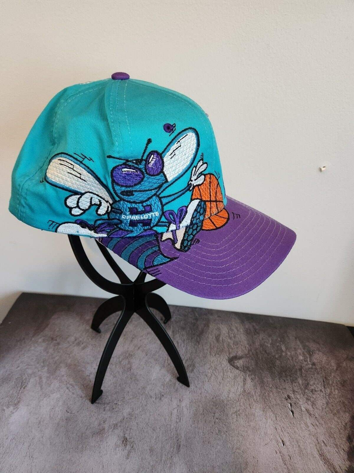 Vintage 1990’s starter charlotte hornets nba snapback hat - super rareLike new. I bought this Hornet's cap in the 90'S wore it once and decided itwas to rare to wear. Stored for the last 30 yearsVery elaborate stichingColors and stitchChas Vintage Shopstarter charlotte hornets nba snapback hat - super rare edition