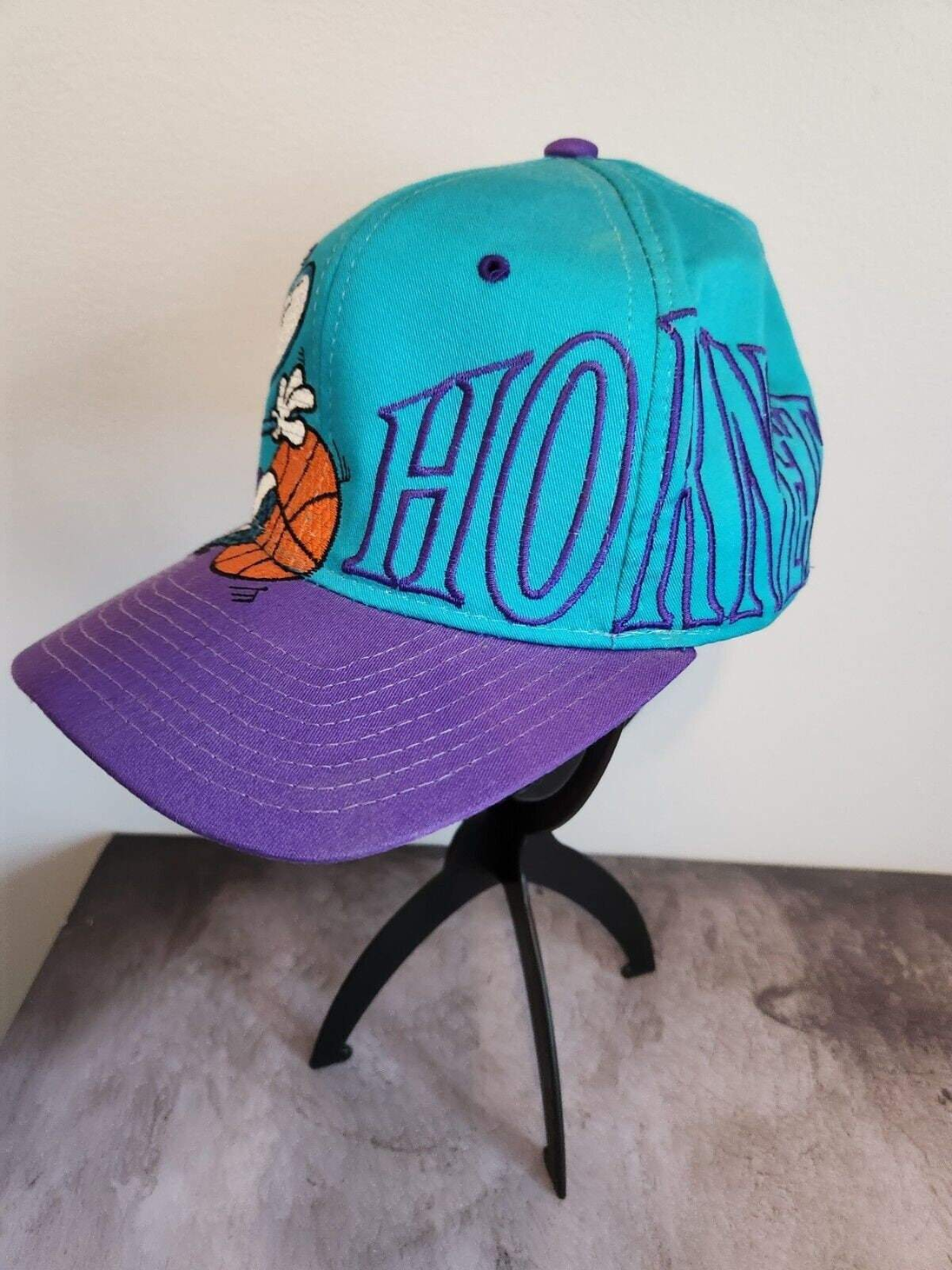 Vintage 1990’s starter charlotte hornets nba snapback hat - super rareLike new. I bought this Hornet's cap in the 90'S wore it once and decided itwas to rare to wear. Stored for the last 30 yearsVery elaborate stichingColors and stitchChas Vintage Shopstarter charlotte hornets nba snapback hat - super rare edition